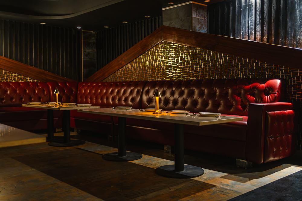 Bellers, buttoned red leather booths beneath the pierced gold screen