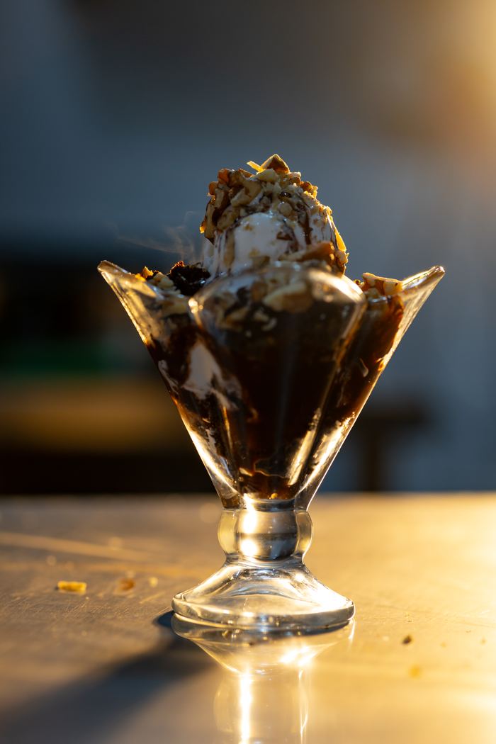 A hot chocolate fudge sundae in the last of the light